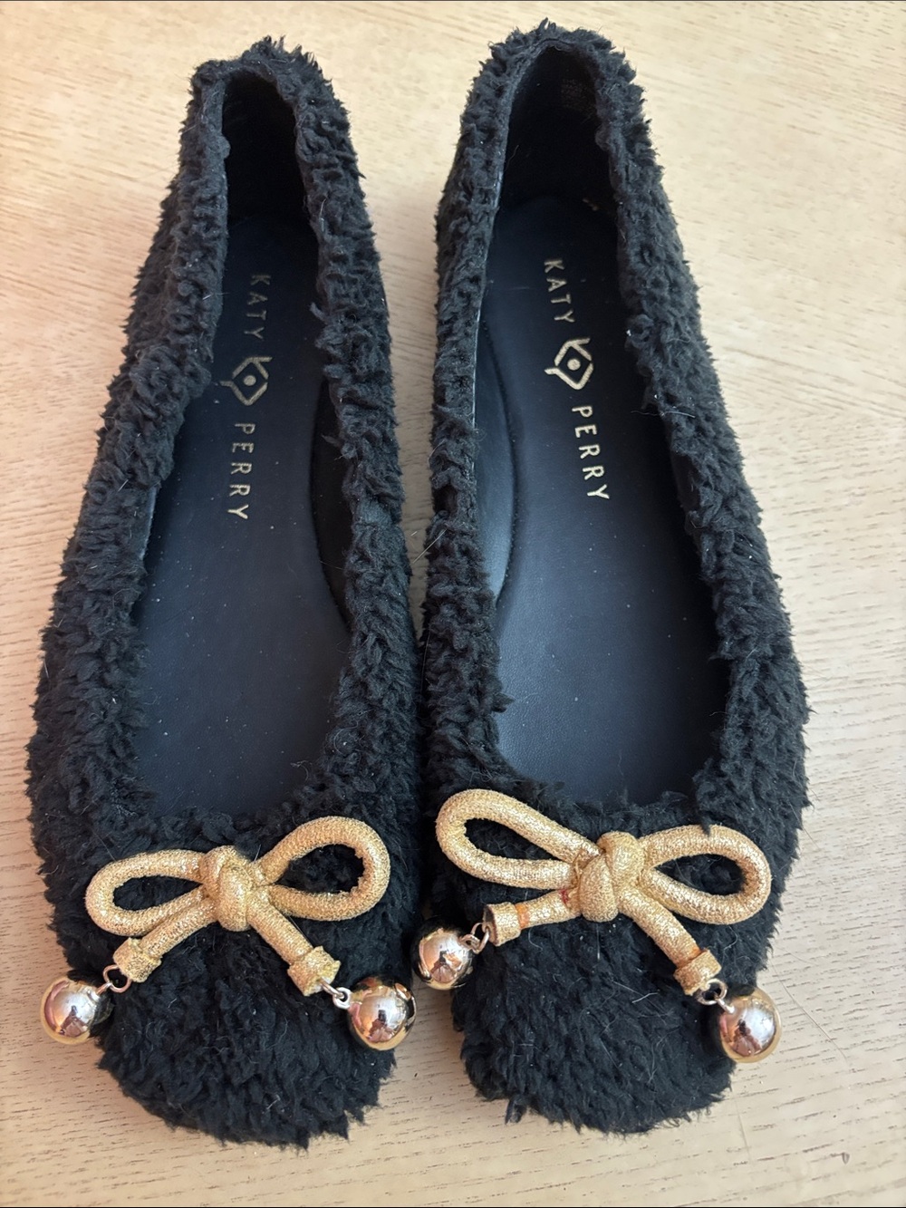 Katy Perry Collections Black Faux-Fur Ballet Flats with Gold Bow and Bell Charms